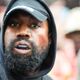 Kanye West aka Ye is seen wearing a Balenciaga boxing mouthguard, outside Givenchy, during Paris Fashion Week - Womenswear Spring/Summer 2023 - Day Seven on October 02, 2022 in Paris, France.